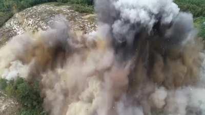 Day in the life of a real miner. 35,000lbs of explosives. Drone is about 300ft up, almost taken out by flyrock!