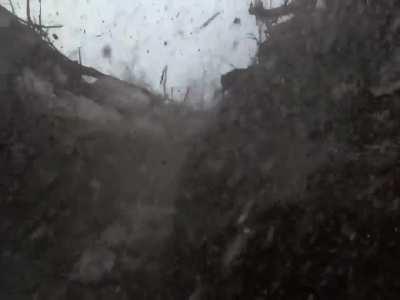 An incoming Russian RPG misses a Ukrainian soldier by inches in Bakhmut