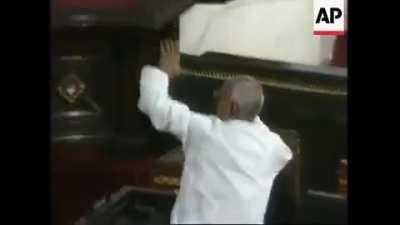 Indian politicians throw chairs at each other during a parliamentary session argument. Folks, I propose an Indian politician sub.