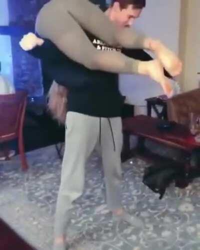 The girl on the couch is his girlfriend