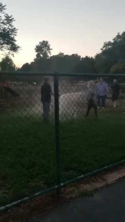 They tried to stop a man from doing his job which is watering the dog park, and they got hosed down as well