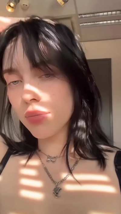 Billie in black top | IG June 2022