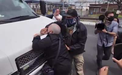Obese Skinhead attempts to block ICE vehicles, has absolute meltdown when challenged.