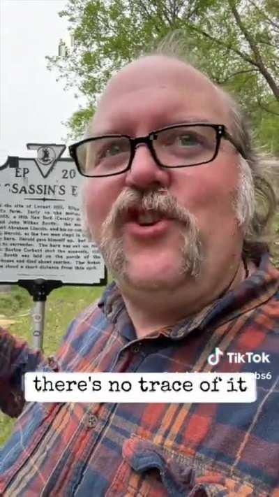 The place where Federal troops captured and killed John Wilkes Booth is a highway median.