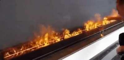 These are NOT Flames, but Rather Water Vapor Illuminated By LED Lighting...