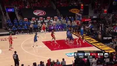 [Highlight] Trae falling out of bounds gets the ball to Huerter for the three