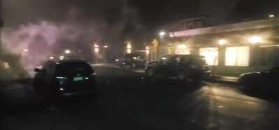 Portland Red House (#15): Guards at Portland's Red House Autonomous Zone are attacked with explosives by two cars driving past checkpoint.