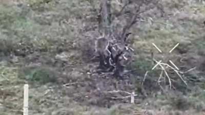 Russian infantryman tries to defend himself  against Ukrainian kamikaze drone