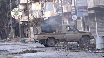 Toyota AA technical being used to shoot and scoot as God intended - Aleppo - 2015