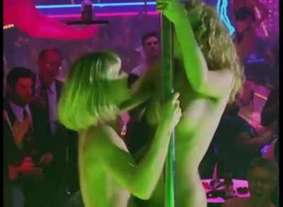 Elizabeth Berkley grinding her bare pussy lips on Rena Riffel's leg in Showgirls