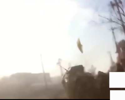 Iraqi golden brigade leading the way in the city.