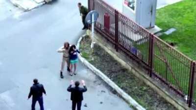 Russian Police/Soldier disarm an actor during kidnapping scene