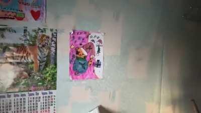 8 year Rita old was reading a book and playing with her kitten Myshka when a cluster bomb landed in the yard. Killing her and her aunt Yulia. Rita's room, her drawings, notebook and princess dress remain untouched. Her mother has no strength for anything 