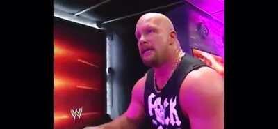 Stone Cold having the time off his life. Cracks 2 beers and rides the office chair down the entrance ramp!