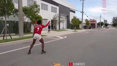 ShowSpeed jumps over two automobiles on livestream..