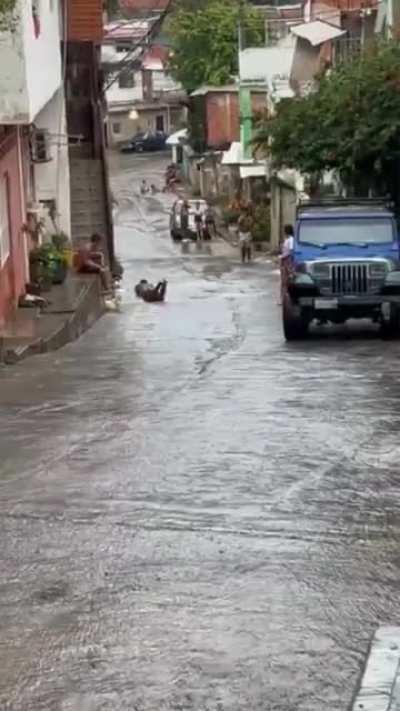 Sliding down the street in your stomach.