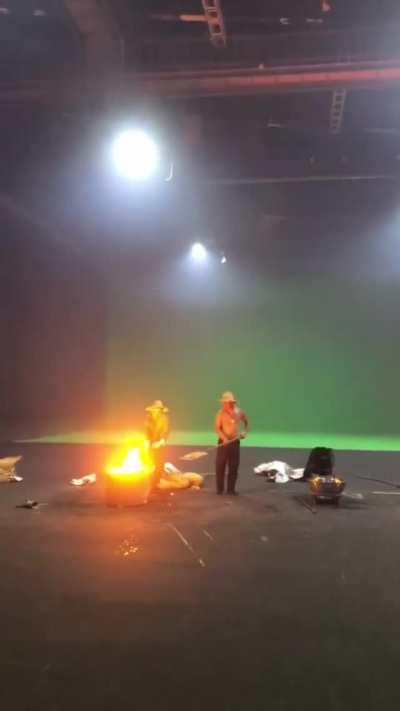 This insane art is called Dashuhua. Hot (1600 °C) melted iron is sprayed to create a spectacular shower of sparks that look like fireworks