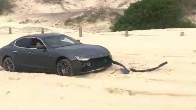 Maserati + Beach + Snatch Strap = Bad