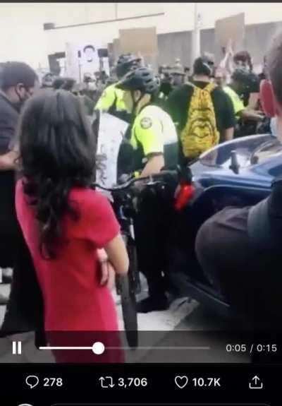 Atlanta Woman Throws Bike at Cop During Protest