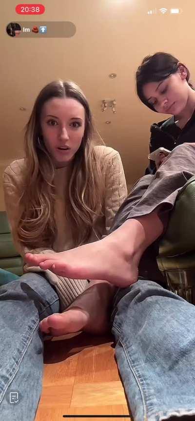 Friend feet in face 