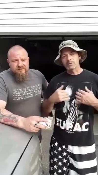 I didn't have high hopes seeing two white guys with racist signs, but.....