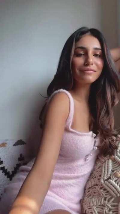 Flaunting her new pink dress nicely :)