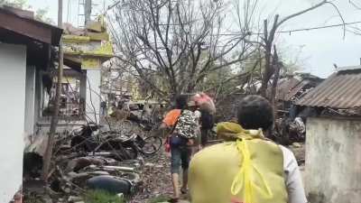 Kachin and allied forces evacuation of 800 civilians from a temporary shelter Bhamo, Myanmar. A bomb fell near their position and killed 2 people, but everyone else was evacuated.