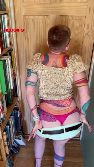 Undressing to show every bit of my tattoos