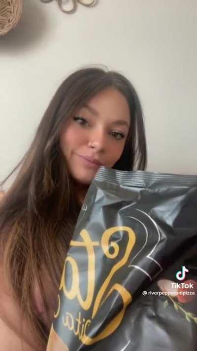 niple exposed to the left of chips bag foopahh