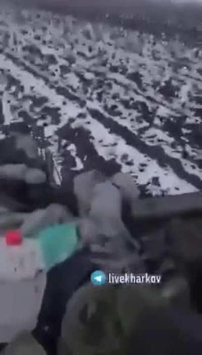 Ukranians with a Russian tank they found