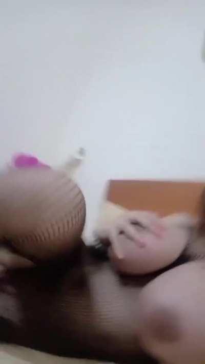 Big tits and cock in fishnets. Donnah Star on her bed (gif)