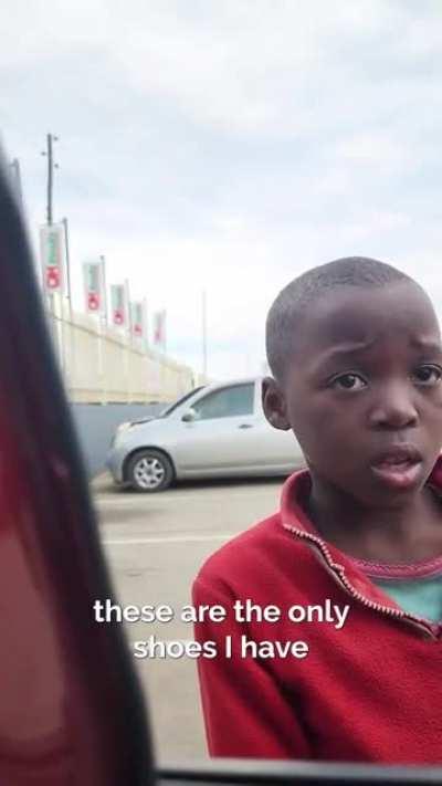 Man gives money to child for...