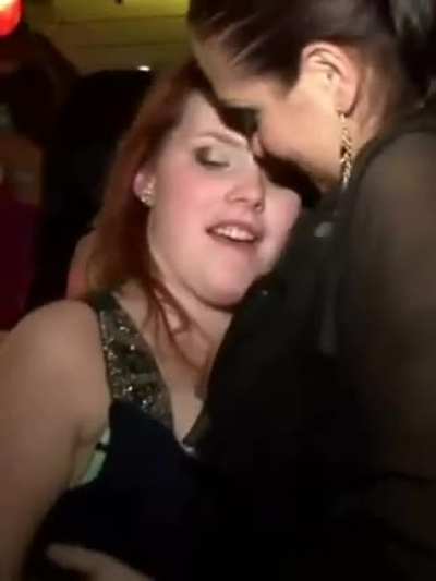 Lesbians are sucking big boobs of each other in party 