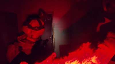 omega special forces clearing a house and using a thermal FPV drone  