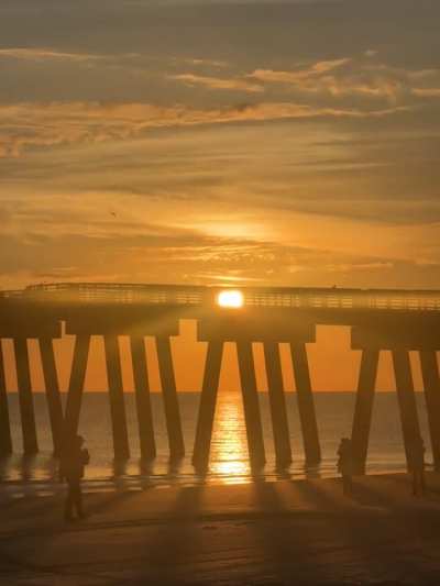 Sun peaking perfectly with the pier early this morning!