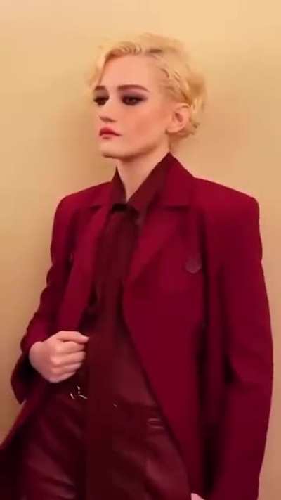 Leggy blonde talent Julia Garner in burgundy outfit