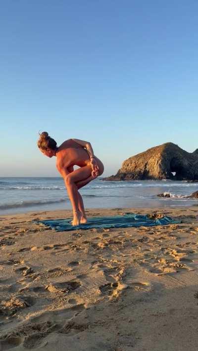 Nice yoga on a public beach