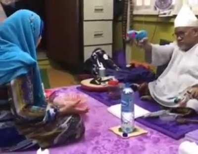 Faith healer performs exorcism using toy guns