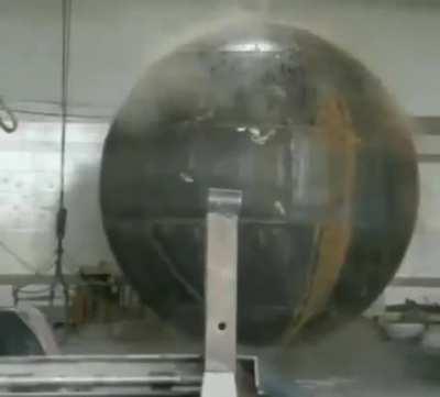 The explosive hydroforming of a steel sphere