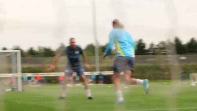 Haaland in training while Pep cheers.