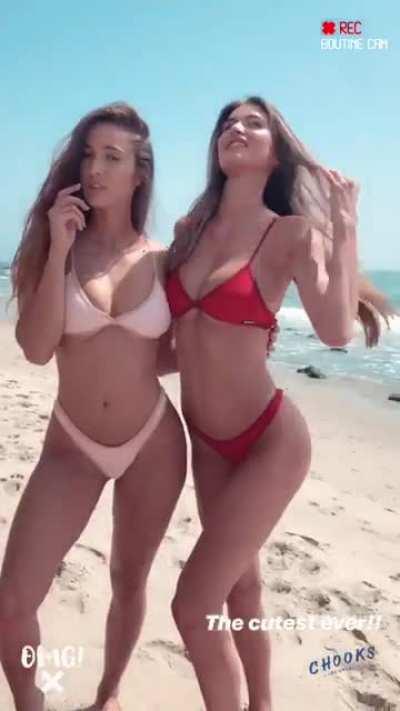 Natalie Roush (light swimsuit) and Hayley Maxfield (red)