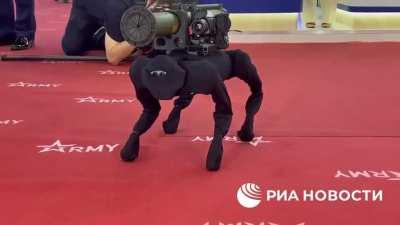 Commercial robot dog with an RPG-26 at the Army 2022 defense expo