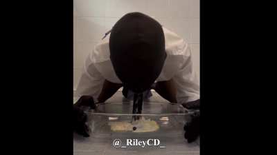 Hooded schoolgirl in stockings gagging on long dildo, puking up banana milkshake meal.