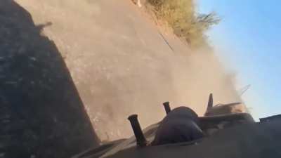 POV of Russian soldiers riding a buggy getting hit by Ukrainian FPV, Sumy region