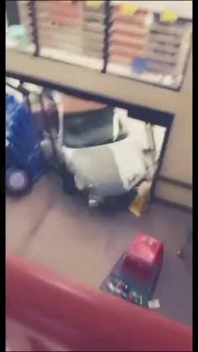 Lunatic Postal; Takes Car for a Joyride Inside Super 1 Supermarket in Columbia Falls, Montana