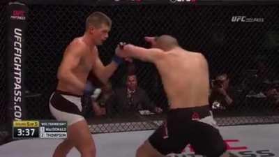 A very aggressive Rory Macdonald and Stephen 