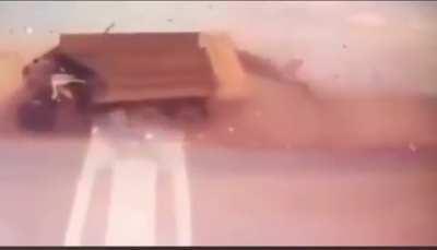 car hit by two trucks