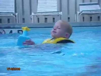2 year old me drinking pool water !