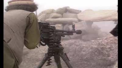 Mujahideen fighters besiges a Democratic Republic of Afghanistan (DRA) Army fort during the Soviet-Afghan War, c, 1984