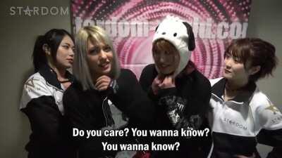 Giulia, Maika, and Natsupoi are confused at Syuri's choice of headwear (Momo-chan)